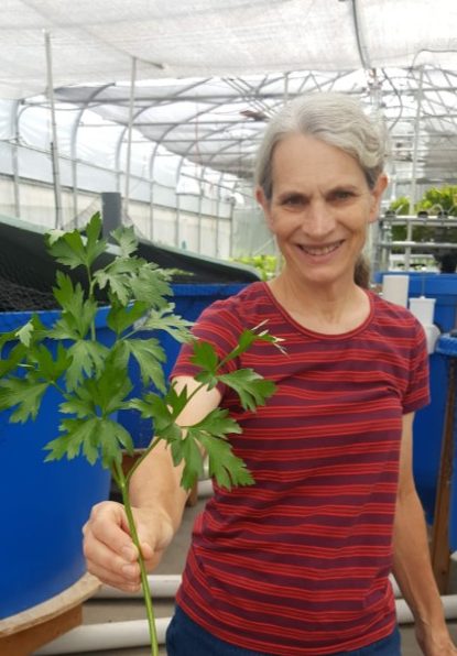 Ann in greenhouse