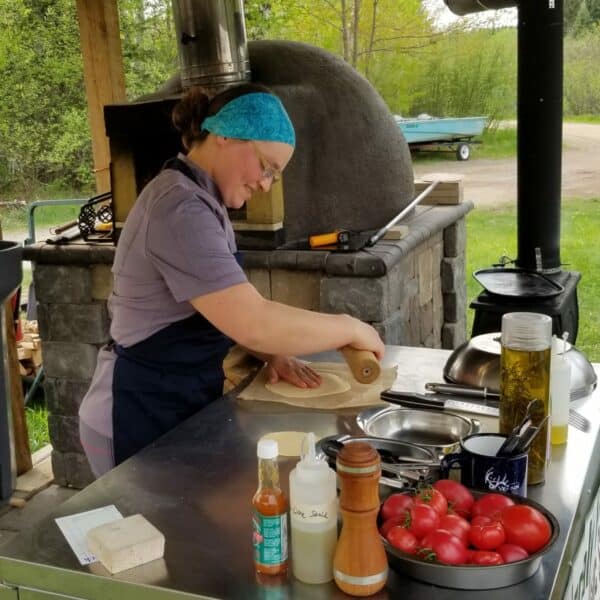 Kara making pizza