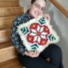 Laura with tapestry pillow
