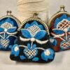 three coin purses