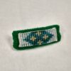small green barrette