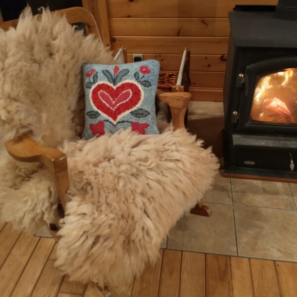 tan downly cloud in chair
