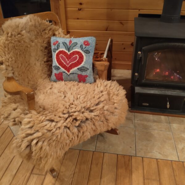 tan dense curly on chair