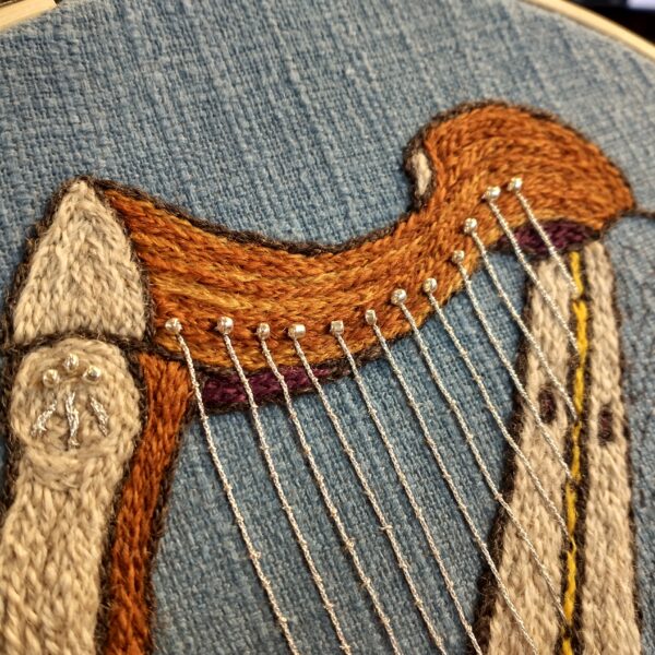harp embroidery closeup